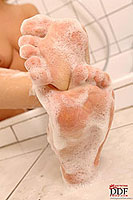 sexy feets in soap foam