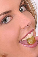 Sharon M with grape in mouth