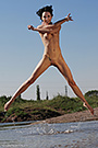 Ukrainian hot naked babe Eleonora B jump outdoors